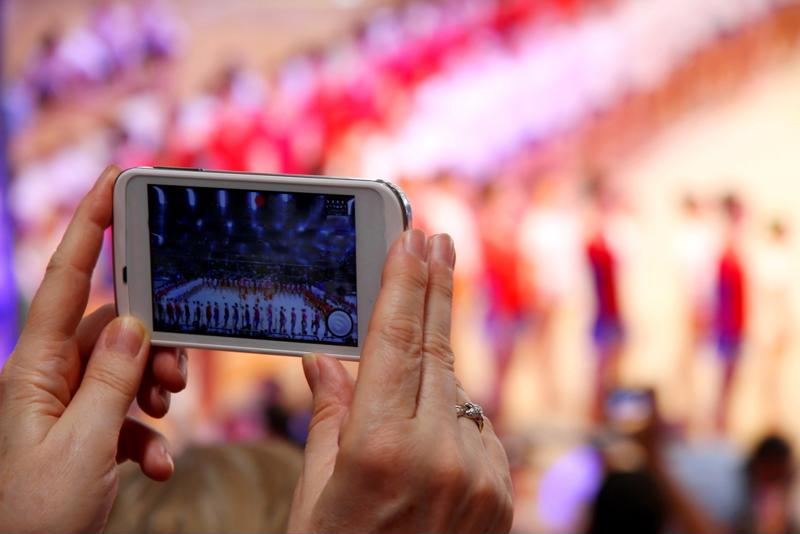 Somebody filming and sharing video is an increasingly common site at sporting venues.
