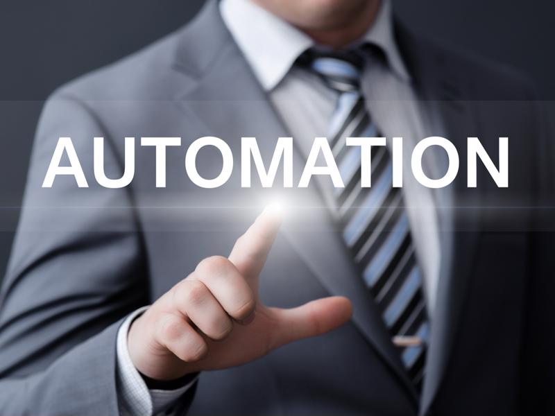 man pointing at the word "automation"